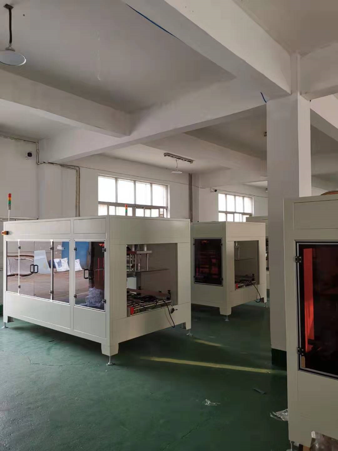 自动周转框套袋机-一字纸箱套袋机-圆筒套袋机