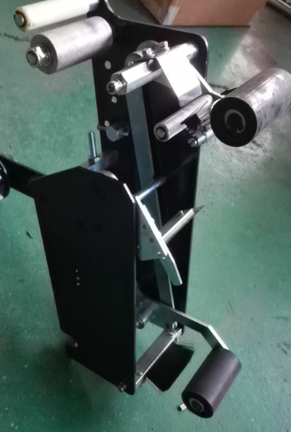 不锈钢贴带器-开箱机贴带器